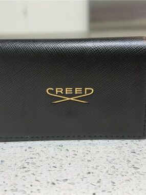 Creed Black Leather Card Case with Gold Emblem